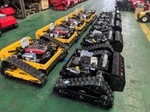 Line of industrial tracked vehicles in warehouse