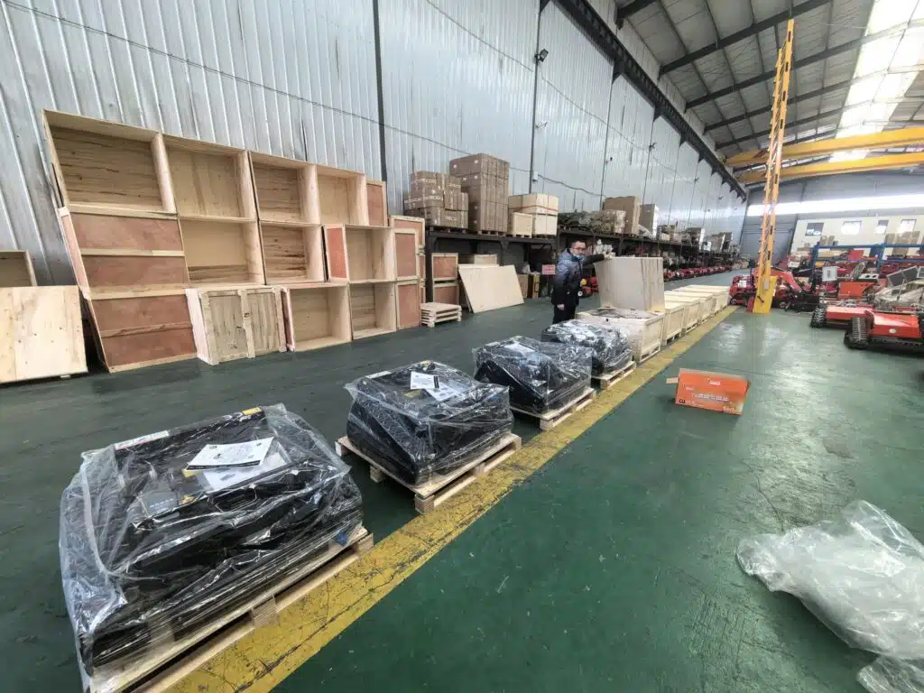 Warehouse interior with stacked wooden crates and forklifts