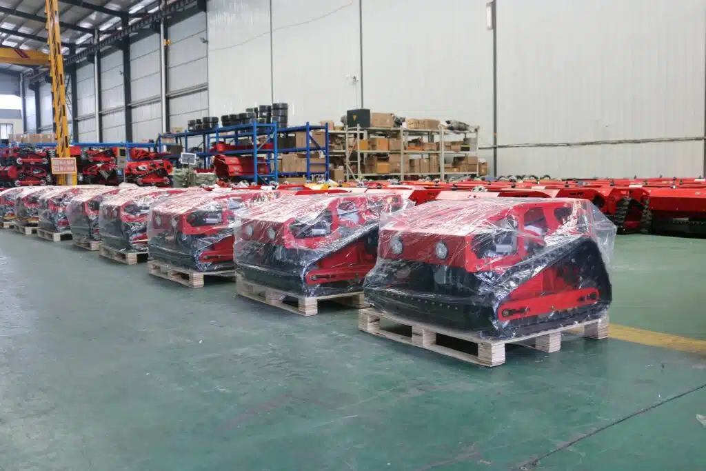 Wrapped tractors stored in industrial warehouse