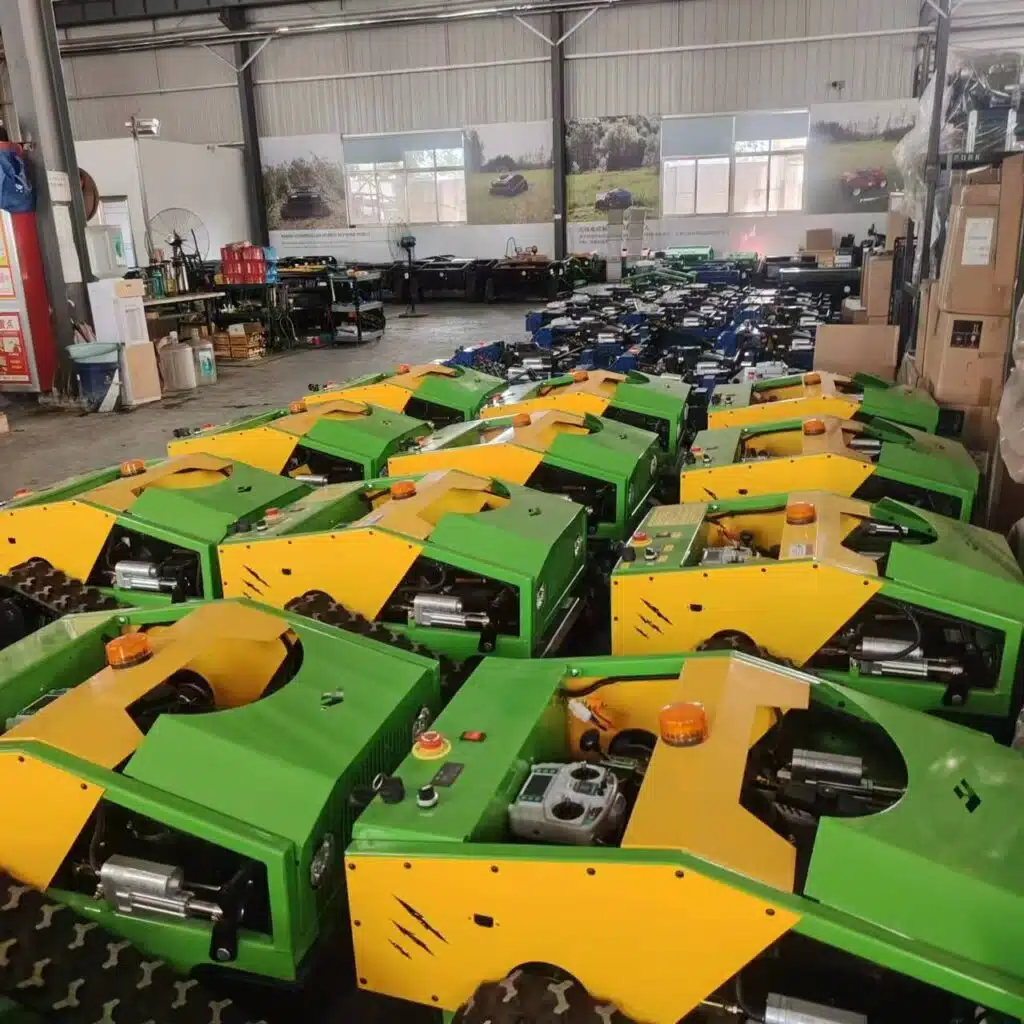 Green and yellow lawnmowers in a warehouse